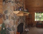 Log fireplace mantle